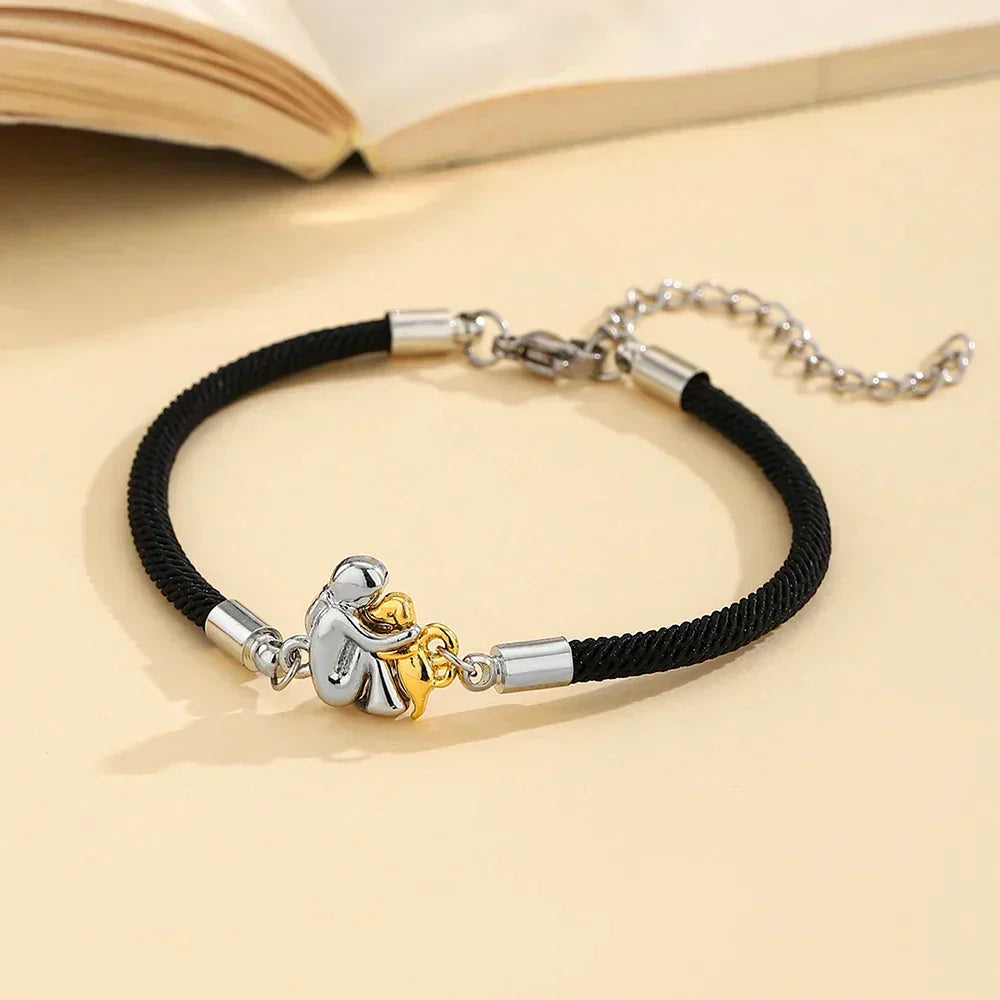 Kati™ - Pulsera de cordón con icono de perro