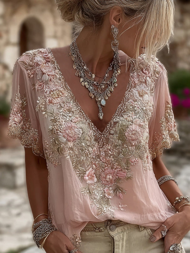 Blusa femenina con delicadas flores bordadas y escote en V elegante