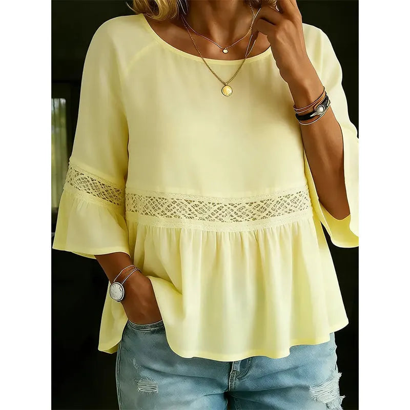 Blusa para mujer con delicado encaje y corte peplum de caída fluida