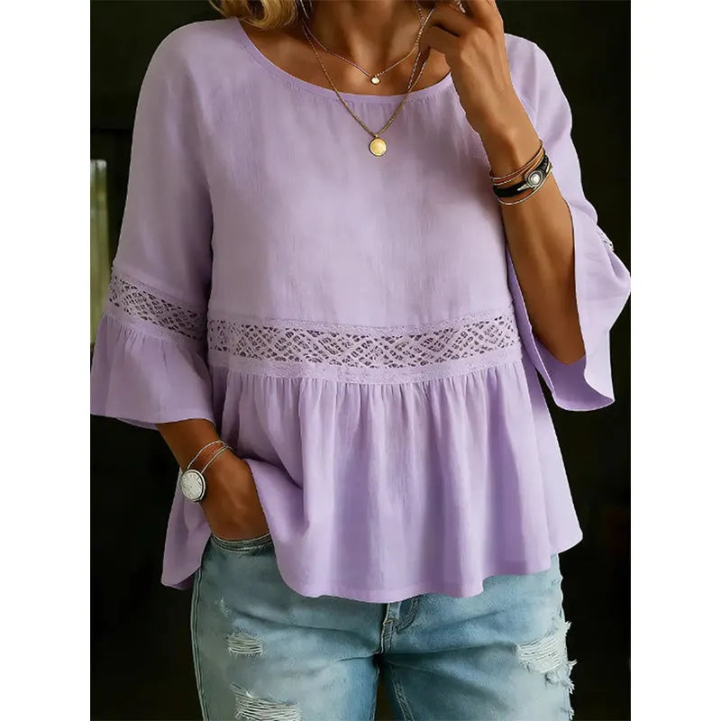 Blusa para mujer con delicado encaje y corte peplum de caída fluida
