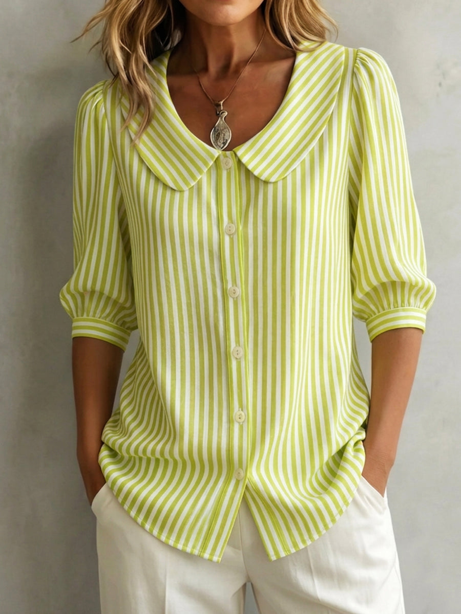 Blusa mujer a rayas verticales, cuello redondo, botones frontales y mangas 3/4 abullonadas — elegante